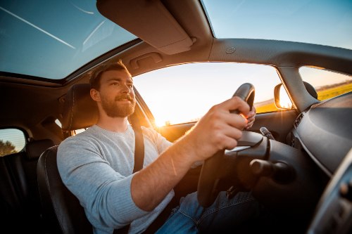 driver with his hands on the wheel